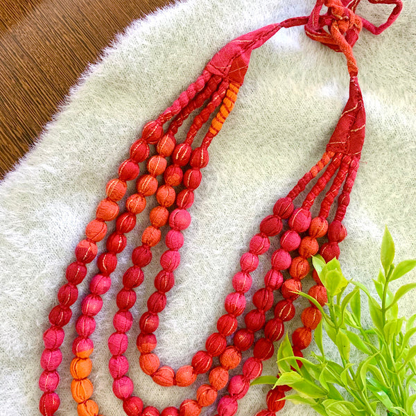 Handcrafted Pink Orange & Red Shaded Bobble Necklace (4 layers)